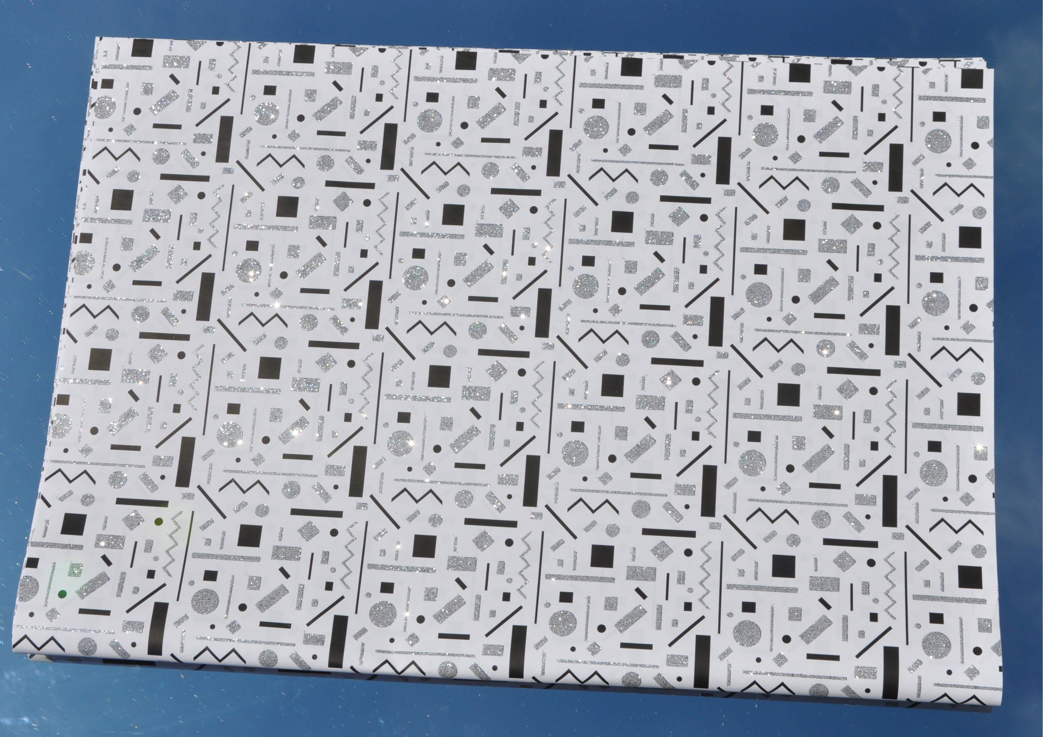 Geometrische Formen mit Glitzer - Geschenkpapier